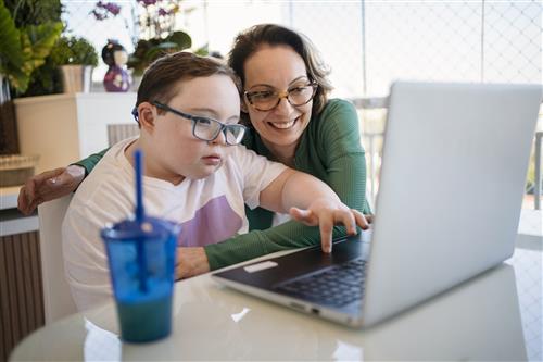 young disabled child accesing the web