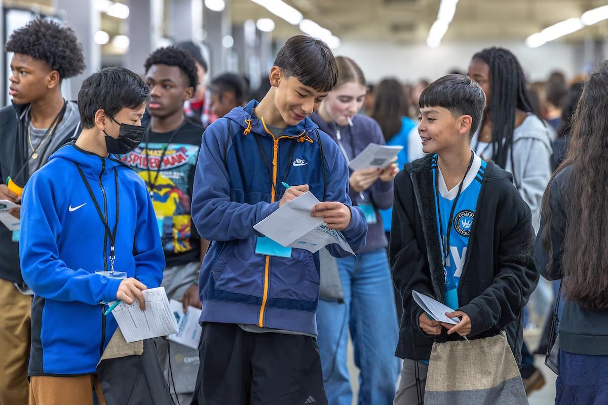Students walk around the Park Expo Center to complete their activities as they visit booths