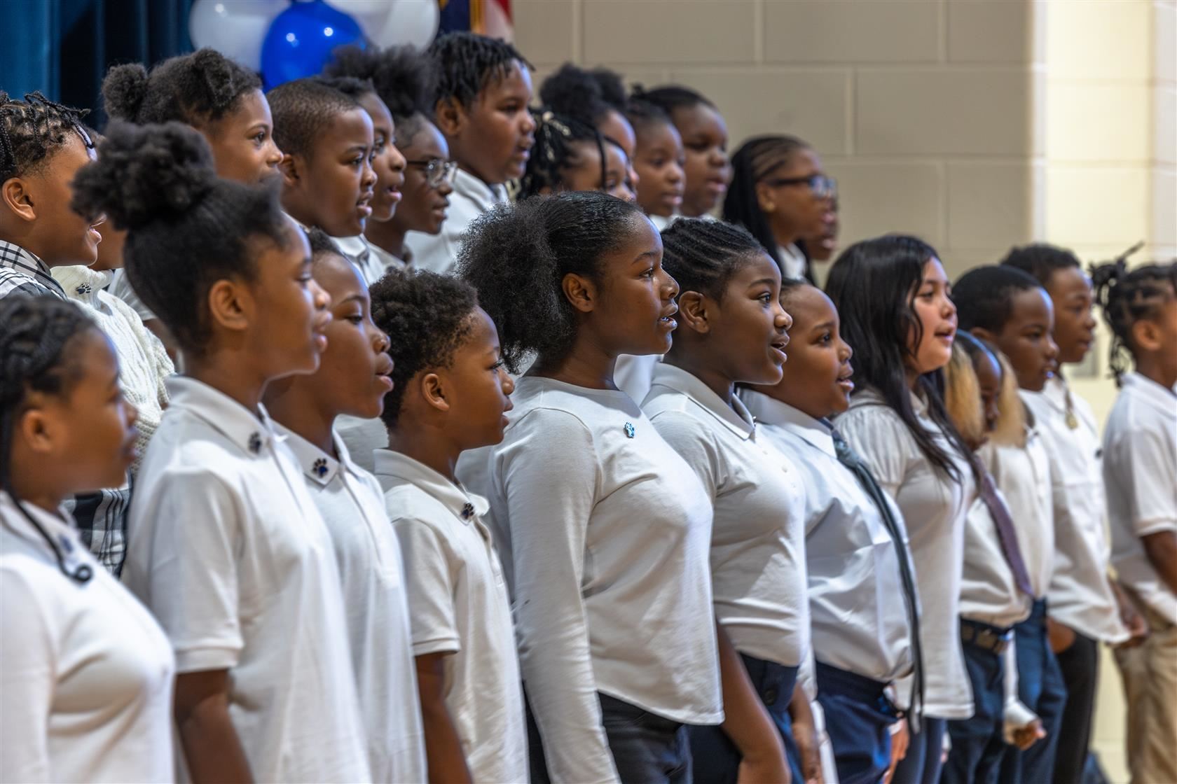 Bruns Avenue Elementary fifth graders sing "Lean on Me" in the school's gym