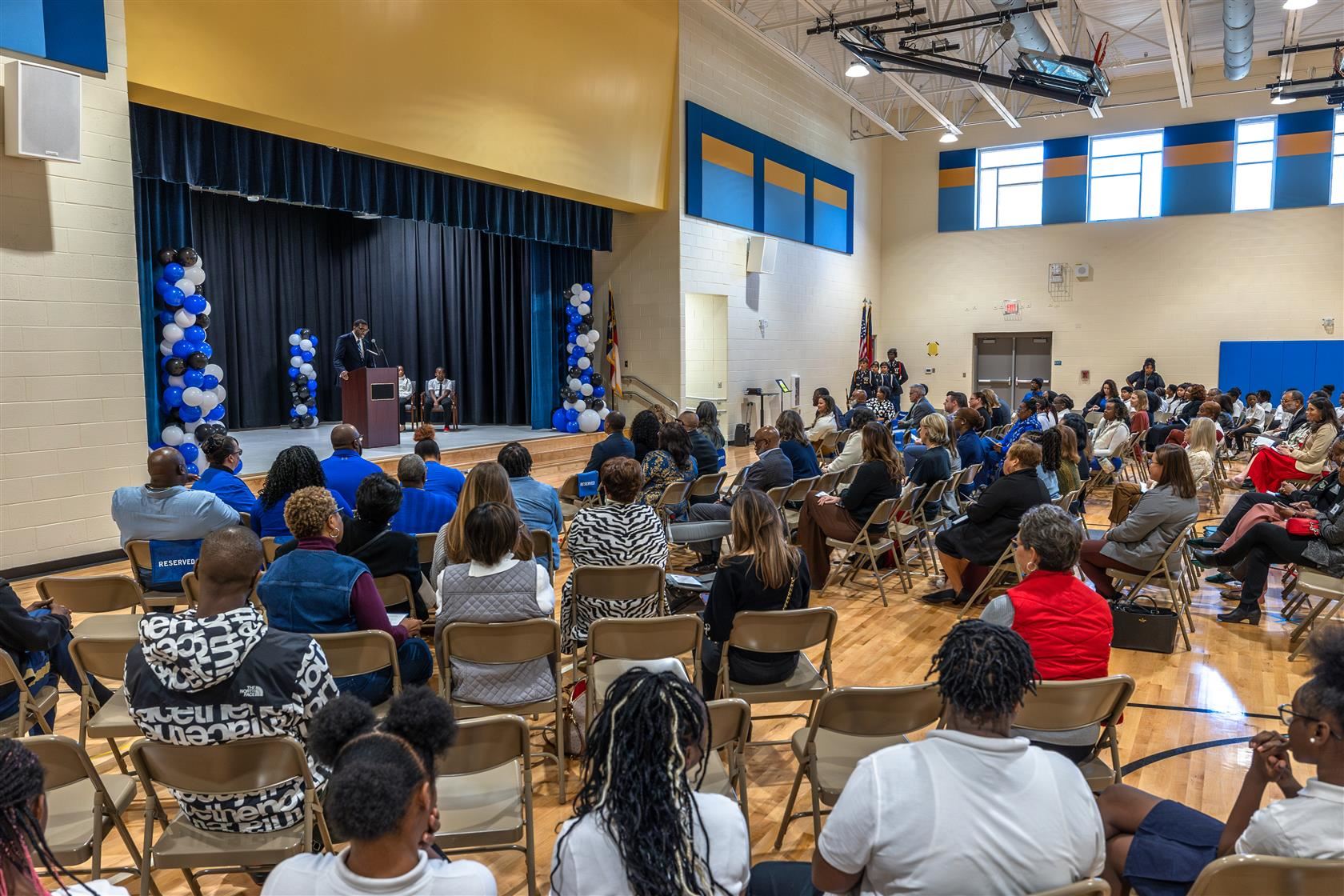 Bruns Avenue Elementary's gym is packed with guests for the school's dedication