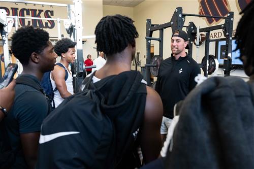 Adam Thielen speaks to Mallard Creek athletes
