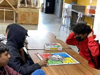 Students playing Sorry